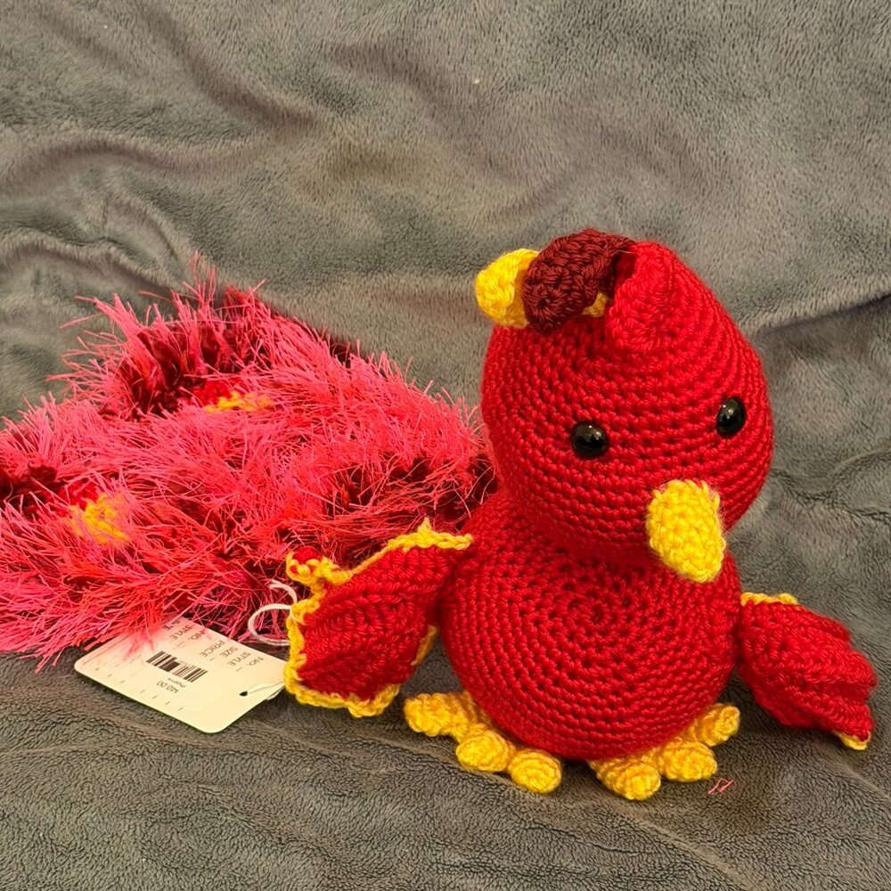 Artisan-created crocheted Ashley the Phoenix Amigurumi